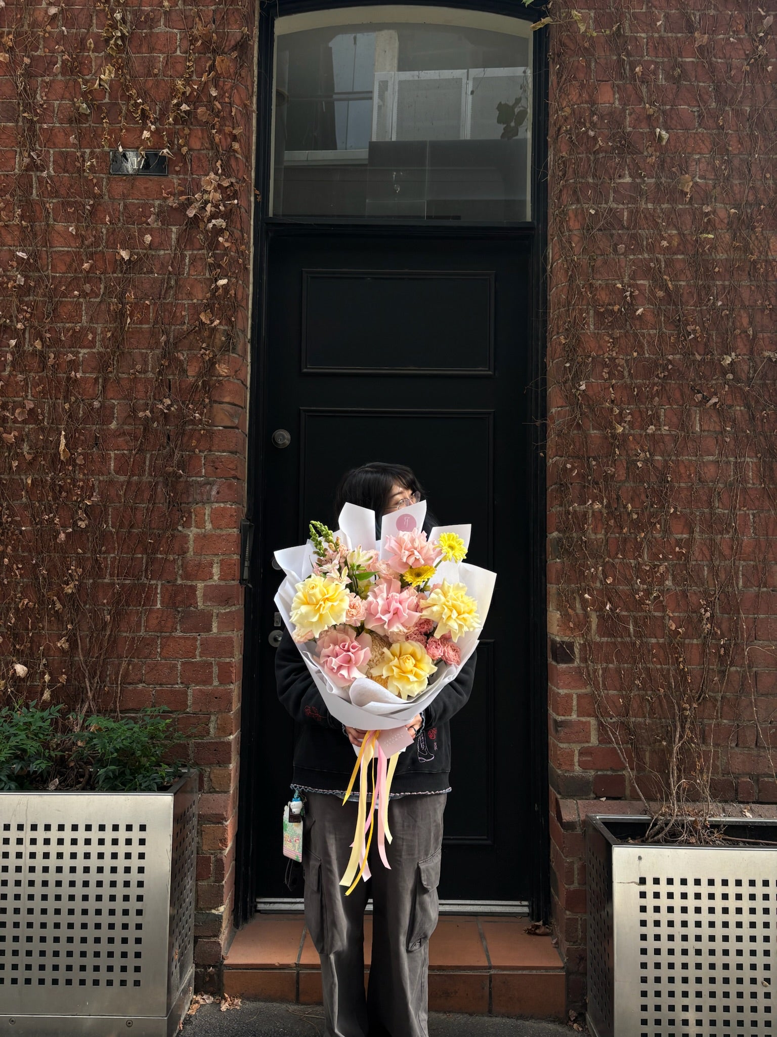Golden Hour bouquet of soft yellow and blush pink flowers, delivered same-day by Feeling Floral, a Melbourne florist.